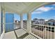 Private balcony overlooking community with a partial view of the ocean at 8049 Lost Shaker Ln, Kissimmee, FL 34747