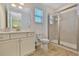 Bathroom with vanity, toilet and large walk-in shower at 8049 Lost Shaker Ln, Kissimmee, FL 34747