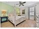 Bedroom with king-size bed and light wood frame at 8049 Lost Shaker Ln, Kissimmee, FL 34747