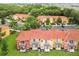 Community of two-story townhomes with terracotta roofs at 8558 Crystal Cove Loop, Kissimmee, FL 34747