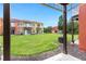 View of the backyard and community at 8558 Crystal Cove Loop, Kissimmee, FL 34747