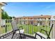 Balcony view of the community with chairs at 8558 Crystal Cove Loop, Kissimmee, FL 34747