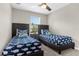 Bedroom with two twin beds and whale-themed bedding at 8558 Crystal Cove Loop, Kissimmee, FL 34747