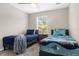 Bright bedroom with two twin beds and ocean decor at 8558 Crystal Cove Loop, Kissimmee, FL 34747