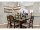 Modern dining area adjacent to the kitchen, perfect for entertaining at 8558 Crystal Cove Loop, Kissimmee, FL 34747