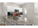Modern kitchen with granite countertops and stainless steel appliances at 8558 Crystal Cove Loop, Kissimmee, FL 34747