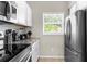 Well-equipped kitchen featuring stainless steel appliances and ample cabinetry at 8558 Crystal Cove Loop, Kissimmee, FL 34747