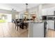 Open concept kitchen and dining area with modern finishes at 8558 Crystal Cove Loop, Kissimmee, FL 34747