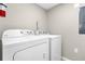 Laundry room with Whirlpool washer and dryer at 8558 Crystal Cove Loop, Kissimmee, FL 34747