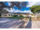 Ranch style home with mature trees and a large yard at 9000 Ogilvie Dr, Orlando, FL 32819