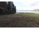Lake access lot with mature trees and green space at 9000 Ogilvie Dr, Orlando, FL 32819