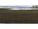 Lakefront lot offering peaceful water views at 9000 Ogilvie Dr, Orlando, FL 32819
