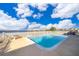 Inviting pool with waterfront views and a white fence at 9000 Ogilvie Dr, Orlando, FL 32819