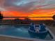 Lakefront pool view at sunset at 9000 Ogilvie Dr, Orlando, FL 32819