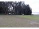 Spacious waterfront lot with covered storage area at 9000 Ogilvie Dr, Orlando, FL 32819