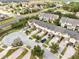 Aerial view showing townhome community and street at 10125 Shadow Leaf Ct, Orlando, FL 32825