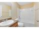 Bathroom with tub, vanity, and updated fixtures at 10125 Shadow Leaf Ct, Orlando, FL 32825