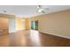 Bright dining area with access to the backyard and a half bathroom at 10125 Shadow Leaf Ct, Orlando, FL 32825