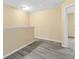 Spacious hallway with light walls and wood-look flooring at 10125 Shadow Leaf Ct, Orlando, FL 32825