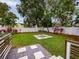 Landscaped backyard with fire pit and grassy area at 105 N Hillside Ave, Orlando, FL 32803