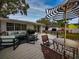Relaxing backyard deck with seating area, umbrella, and fire pit at 105 N Hillside Ave, Orlando, FL 32803