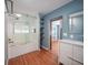 Modern bathroom with walk-in shower and soaking tub at 105 N Hillside Ave, Orlando, FL 32803