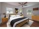 Bright bedroom with hardwood floors and ceiling fan at 105 N Hillside Ave, Orlando, FL 32803