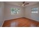 Bright bedroom with hardwood floors and a large window at 105 N Hillside Ave, Orlando, FL 32803