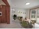 Cozy dining area with a wooden table and green chairs at 105 N Hillside Ave, Orlando, FL 32803