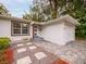 Updated front entrance with modern door and stone walkway at 105 N Hillside Ave, Orlando, FL 32803