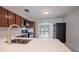 Modern kitchen with white countertops and stainless steel appliances at 105 N Hillside Ave, Orlando, FL 32803