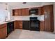 Updated kitchen features modern appliances and cabinetry at 105 N Hillside Ave, Orlando, FL 32803