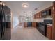 Modern kitchen with wood cabinets and stainless steel appliances at 105 N Hillside Ave, Orlando, FL 32803