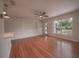 Bright living room with hardwood floors and big windows at 105 N Hillside Ave, Orlando, FL 32803