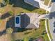 House with pool and landscaped yard, aerial view at 11113 Scenic Vista Dr, Clermont, FL 34711