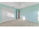 Bedroom with double doors leading to a closet and bathroom at 11113 Scenic Vista Dr, Clermont, FL 34711