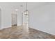 Spacious dining area with tile floors and access to other rooms at 11113 Scenic Vista Dr, Clermont, FL 34711