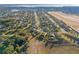 Aerial view of large neighborhood near lake at 11113 Scenic Vista Dr, Clermont, FL 34711