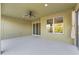 Covered patio with pool access and view of backyard at 11113 Scenic Vista Dr, Clermont, FL 34711