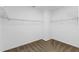 Large walk-in closet with wire shelving and carpet flooring at 11113 Scenic Vista Dr, Clermont, FL 34711