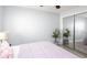 Bedroom with full-size bed and mirrored closet doors at 1130 Brant Pt, Orlando, FL 32828