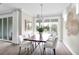 Dining room with sliding glass doors leading to backyard at 13714 Fresh Ivy St, Winter Garden, FL 34787