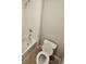 Small bathroom with toilet and bathtub at 14515 Crestavista Ave, Clermont, FL 34714