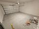 Unfinished garage with concrete floor at 14521 Crestavista Ave, Clermont, FL 34714