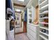 Large walk-in closet with ample shelving and drawers at 1816 Bimini Dr, Orlando, FL 32806