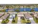 Aerial view showcasing homes near a lake, ideal for water lovers at 1942 J Lawson Blvd, Orlando, FL 32824