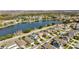 Aerial view of house and neighborhood near a lake at 1942 J Lawson Blvd, Orlando, FL 32824