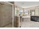 Elegant bathroom with soaking tub, walk-in shower, and double vanity at 1942 J Lawson Blvd, Orlando, FL 32824