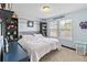 Large bedroom with a king-size bed and plenty of shelving at 1942 J Lawson Blvd, Orlando, FL 32824