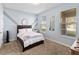 Bright bedroom with lake view and neutral color scheme at 1942 J Lawson Blvd, Orlando, FL 32824